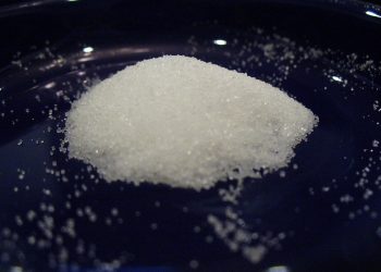 White crystals on a blue background